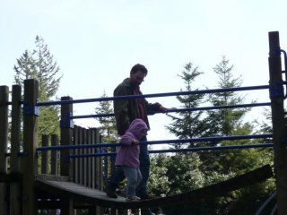 Papa and CareBear cross a bridge.