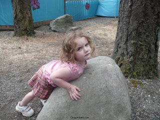 But she cannot lift the rock.