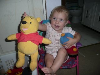 Then she shows us Pooh Bear.