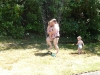 Teaching the kids to jump through the sprinkler.