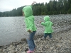 CareBear and LiliBee throw things in the lake.