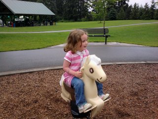 CareBear is on a horse.