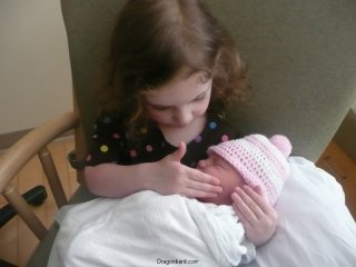 Checking out the new baby.