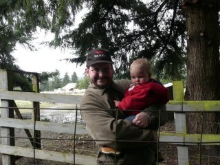 LiliBee watches chickens with Papa.