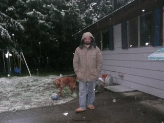 Chris and Lucy play in the snow.