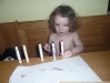 CareBear ponders her markers.