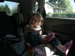 Big girl in a booster seat.