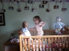 Playing in the crib.