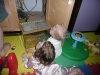 Helping Papa feed Mel.