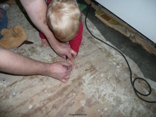 Tracing LiliBee\'s hands.