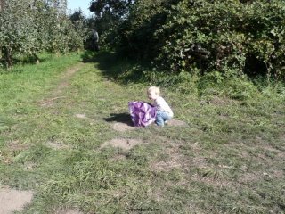 LiliBee checks the apple haul.