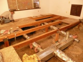 The floor starts going back on!