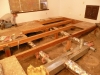 The floor starts going back on!