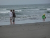 Auntie T, Grandma and Hannah on the beach.